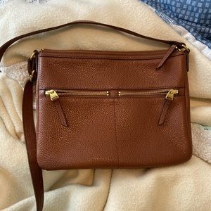 Caramel colored fossil crossbody bag